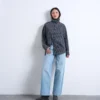 Tscinch-jeans med lav talje og vid benvidde