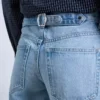 Tscinch-jeans med lav talje og vid benvidde